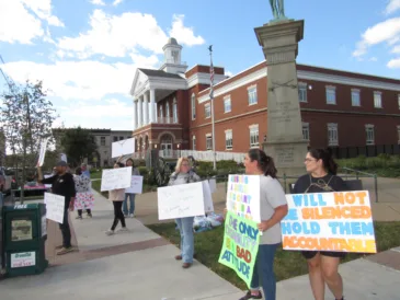 McNinch School Abuse Trials Waived Until Next Term of Court; People Protest Outside of Courthouse